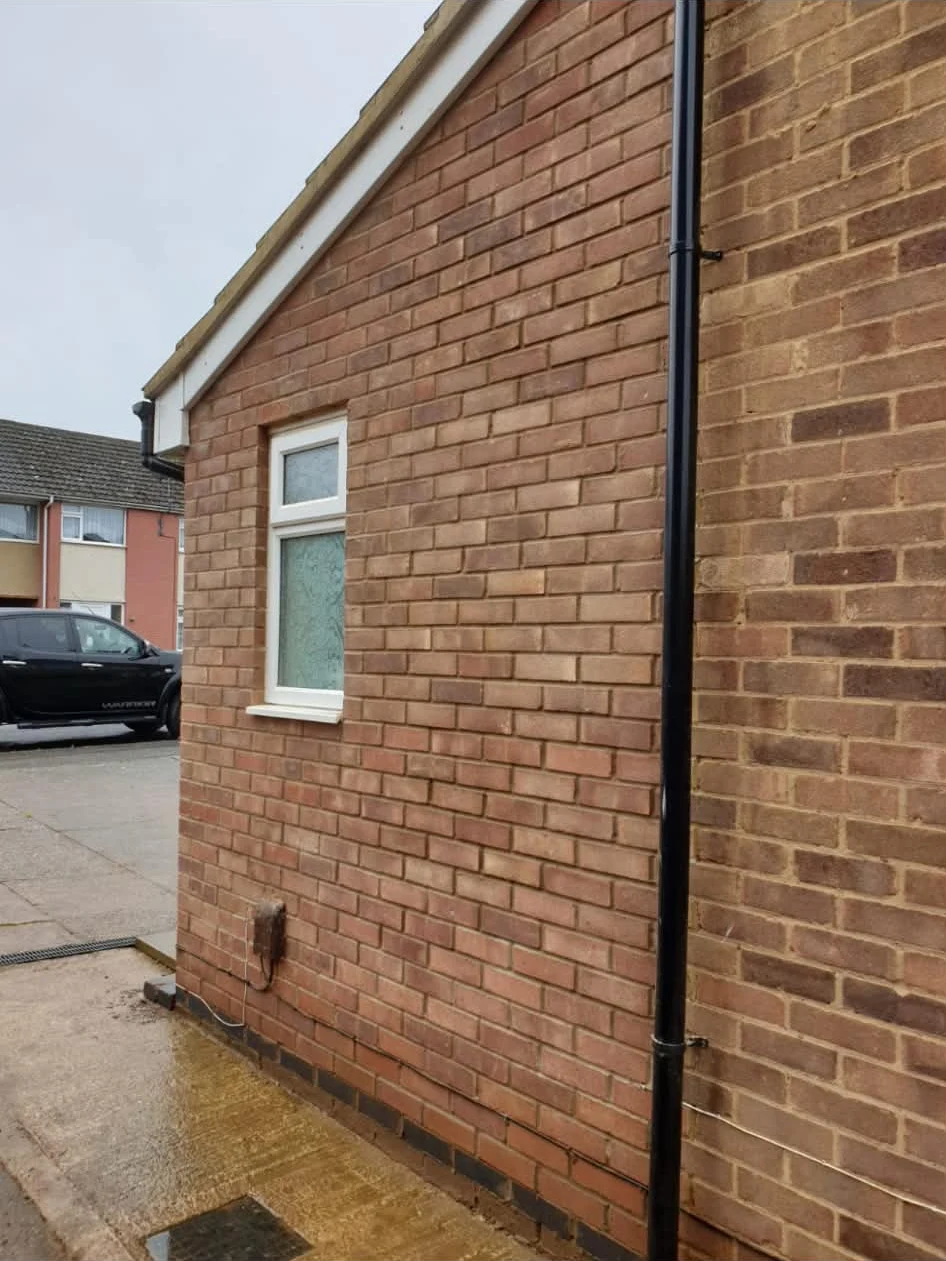 Side elevation of a brick home extension